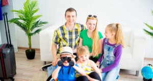 Family packing suitcases