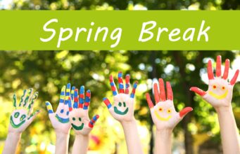 Painted hands with a sign saying "Spring Break"