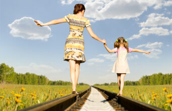 Juggling Career and Motherhood: Top Time Management Tips for Working Mums Mother with daughter